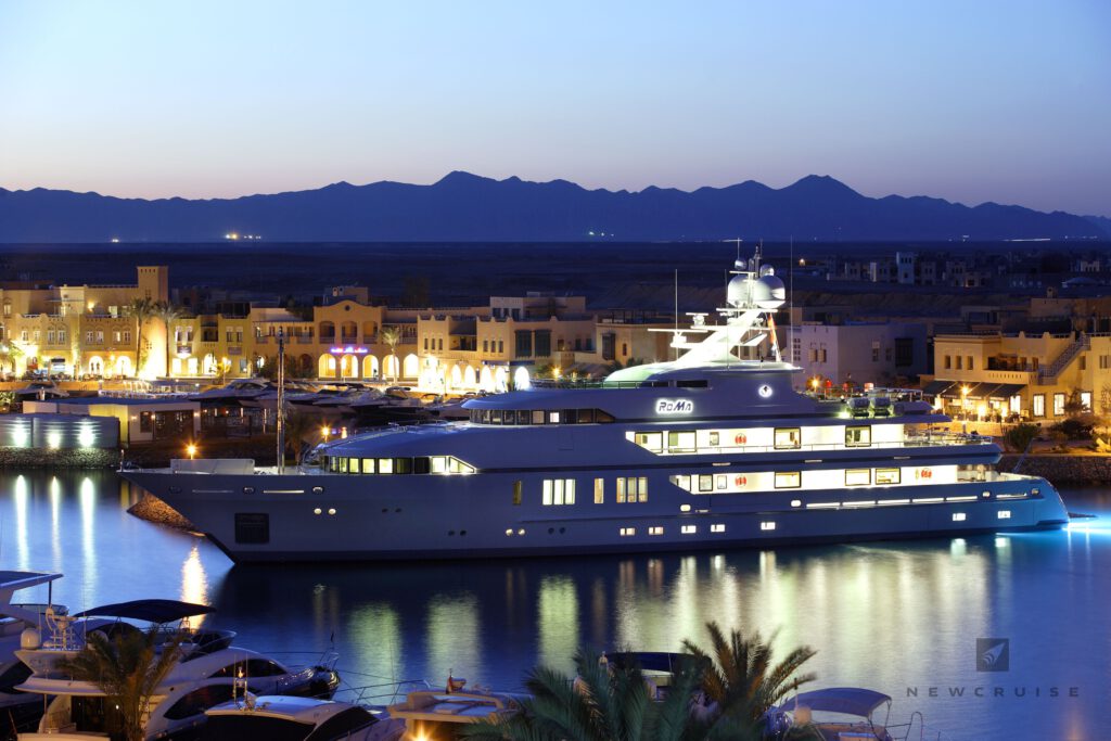 Superyacht at anchor in a marina
